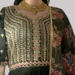 Dark green color and intricate gold embroidery lehenga