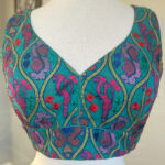 Embroidered  V-Neck Teal color Sleeveless Stitched Blouse