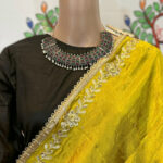 Yellow color lightweight dupatta with golden lash work