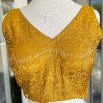 Mustard color  Sleeveless Stitched Blouse