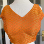 Orange color  Sleeveless Stitched Blouse