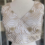 Off white/Silver Color Sleeveless Stitched Blouse