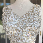 White color with flower applique Sleeveless Stitched Blouse