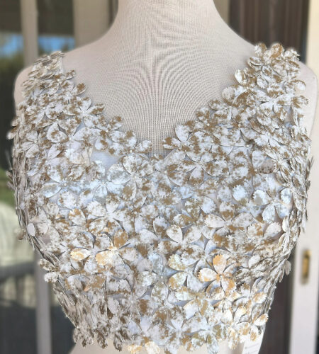 White color with flower applique Sleeveless Stitched Blouse