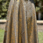 Grey color skirt with pipe worked netted Blouse/Choli